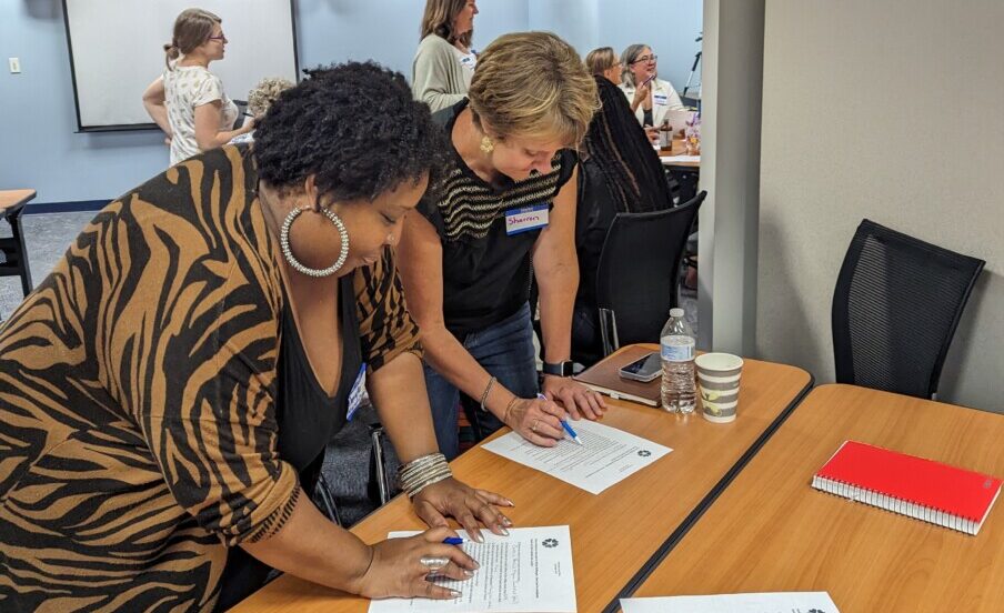 Rebecca and Dannie looking at the scavenger hunt